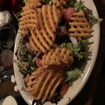 The Cove - Steak and fries salad - Seafood Near Me - Erie, Pennsylvania The Cove - Steak and fries salad - Seafood Near Me - Erie, Pennsylvania