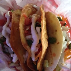 Es Tas Bar and Grill - Fish, steak, and pork tacos. You can choose soft shell or hard, I'd recommend the hard shell!
