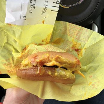 McDonald's - a person holding a hot dog - Coffee & Tea Near Me - Natick, Massachusetts McDonald's - a person holding a hot dog - Coffee & Tea Near Me - Natick, Massachusetts