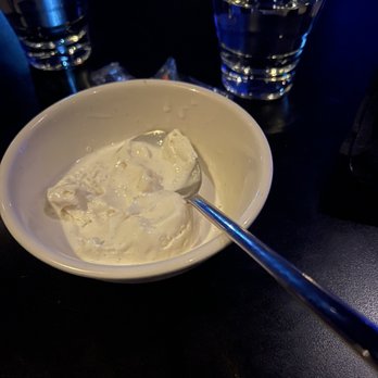 The Triple Door - Vanilla ice cream with giant metal spoon. Could have been used as a soup ladle lol. - Asian Fusion Near Me - Seattle, Washington