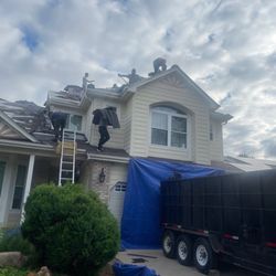 King Roofing Company - The crew working on re-roofing.