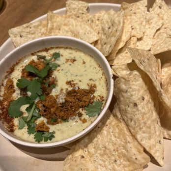 Flower Child - Green Chile Queso with chickpea chorizo - Vegetarian Near Me - Denver, Colorado Flower Child - Green Chile Queso with chickpea chorizo - Vegetarian Near Me - Denver, Colorado