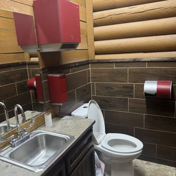 On The Patio - Downstairs bathroom. The main women's bathroom has a really short toilet. Difficult to maneuver. - Sports Bars Near Me - Azle, Texas On The Patio - Downstairs bathroom. The main women's bathroom has a really short toilet. Difficult to maneuver. - Sports Bars Near Me - Azle, Texas