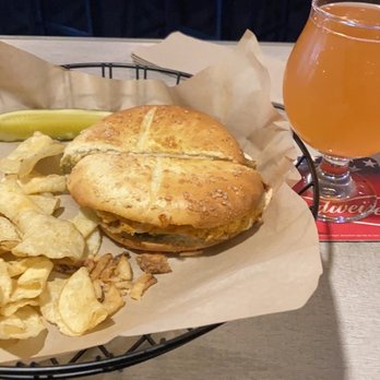 The Hop Knot - vegetarian pretzel sandwich with chips and Apucka Lips Wow mango pineapple sour beer. - Beer Bar Near Me - Manchester, New Hampshire