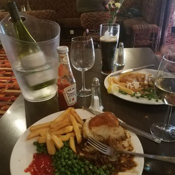 The Stables - Steak pie, my own personal bottle of Chardonnay, and my papas fish and chips and Guinness - British Near Me - Glasgow, GLG