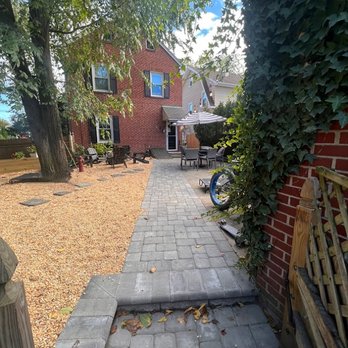 Ryan's Green Thumb Landscaping - a brick walkway leading to a house - Landscaping Near Me - Pennsauken Township, New Jersey Ryan's Green Thumb Landscaping - a brick walkway leading to a house - Landscaping Near Me - Pennsauken Township, New Jersey