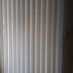 Shade for sliding door with pockets that open for ease of entry and exit. Shade for sliding door with pockets that open for ease of entry and exit.