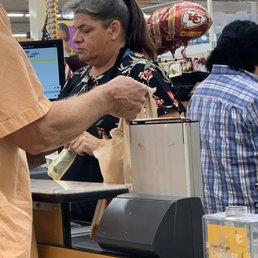 a man at a cash register