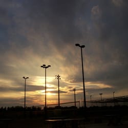 Po' Boys Restaurant - Beautiful sunset above volley ball nets, and batting cages