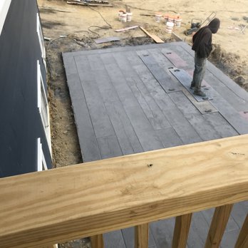 Timeless Impressions Concrete - a man standing on a deck - Masonry/Concrete Near Me - Kirkersville, Ohio Timeless Impressions Concrete - a man standing on a deck - Masonry/Concrete Near Me - Kirkersville, Ohio