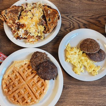 Diner 31 - Meat lovers skillet with raisin toast, Belgian waffle, two eggs with sausage patties - American Near Me - Manistee, Michigan