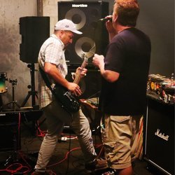Track Side Rehearsal Studio - Eric on guitar. While RJ Walker is on the Mic. Singing like there's a special Lady in his life. He is definitely looking to hook up. LOL!!!