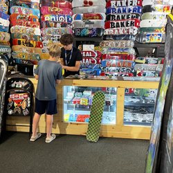 Surfside Sports - Dan helping my son build a new board.
