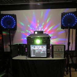 This is the D.I.Y. rental package at $300 for 24 hours. Everything's on hard drive, music videos, karaoke, wireless microphones, projector