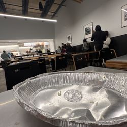 Line of people waiting to be served by the slow staff.
