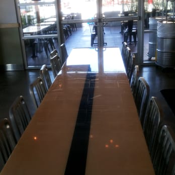 Pieology Pizzeria Southbay Pavillion Mall - Long table by patio door - Pizza Near Me - Carson, California Pieology Pizzeria Southbay Pavillion Mall - Long table by patio door - Pizza Near Me - Carson, California