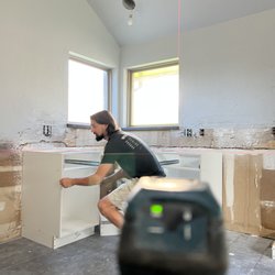 Hunter Tile & Construction - The courts installers, and Tile Setter's love level cabinets. So we give it to them.