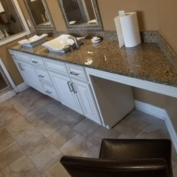 Kelvin's Custom Cabinets - a bathroom with granite countertops - Cabinetry Near Me Kelvin's Custom Cabinets - a bathroom with granite countertops - Cabinetry Near Me