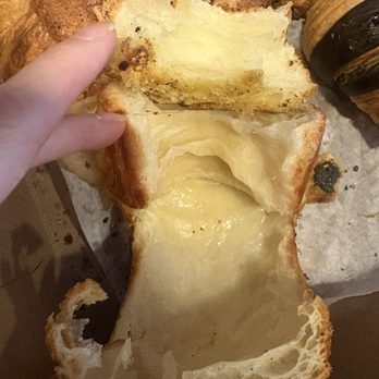 Nino's Bakery - Where's the cheese? Completely hollow with tiny quarter size at one end. Ridiculous - Bakeries Near Me - Washington, DC, District of Columbia