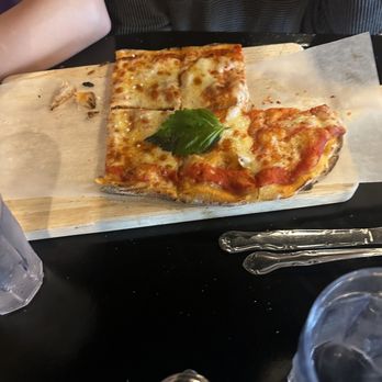Pizzicata - Pizza looks so good. We couldn't wait before we took a picture.  Margarita, pizza - Pizza Near Me - Mesa, Arizona
