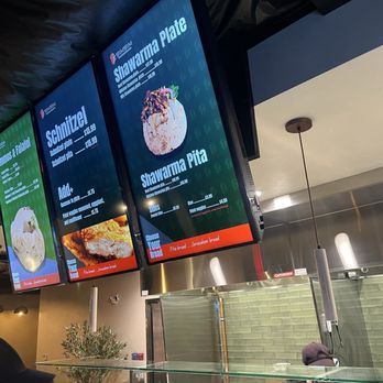 SimSim Shawarma House - Menu on monitors above - Mediterranean Near Me - Anaheim, California SimSim Shawarma House - Menu on monitors above - Mediterranean Near Me - Anaheim, California