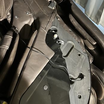 Lucas Moving & Home Services - Another angle of massage chair arm ripped out of its wires. - Movers Near Me Lucas Moving & Home Services - Another angle of massage chair arm ripped out of its wires. - Movers Near Me