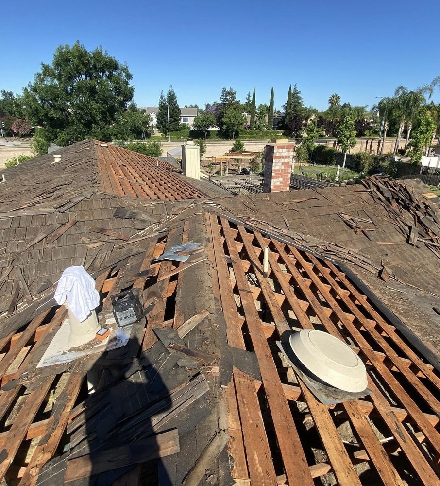 Slide of Cardenas Roofing & Gutter