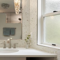 Red Door Interiors - Beautiful details in this elegant bathroom