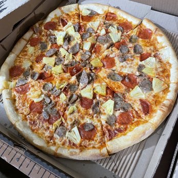 Pagliacci Pizza - Pineapple, sausage, and pepperoni - Pizza Near Me - Seattle, Washington