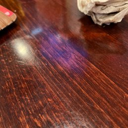 a crumpled napkin on a wooden table a crumpled napkin on a wooden table