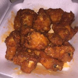 They make the best wings! And when you pick them up, the sauce is on the side so that the wings don't get soggy. Genius!