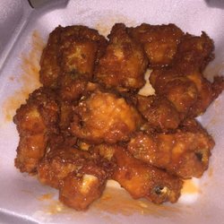 They make the best wings! And when you pick them up, the sauce is on the side so that the wings don't get soggy. Genius!