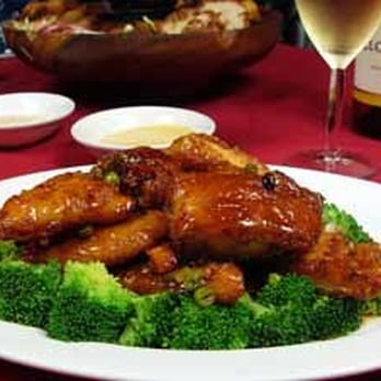 Mandarin Kitchen - Lightly breaded and covered with a mild sweet brown sauce, our Halibut Peking Style is surrounded by broccoli. - Cantonese Near Me - Des Moines, Washington Mandarin Kitchen - Lightly breaded and covered with a mild sweet brown sauce, our Halibut Peking Style is surrounded by broccoli. - Cantonese Near Me - Des Moines, Washington