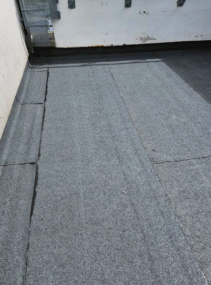 Slide of Pecan Park Roofing