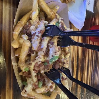 The Station Bar & Grub - Loaded fries - Sports Bars Near Me - Sanford, Florida The Station Bar & Grub - Loaded fries - Sports Bars Near Me - Sanford, Florida