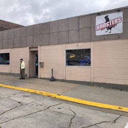 Roosters Bar & Grill - Exterior View with Dad in Picture