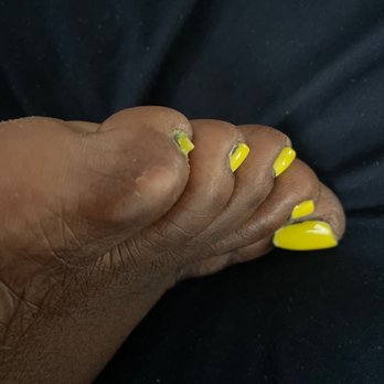 Lovely Nails - Left foot toes This was the toes I asked her to fix and she refused to fix it. It still has green polish from my last service - Nail Salons Near Me - Greer, South Carolina