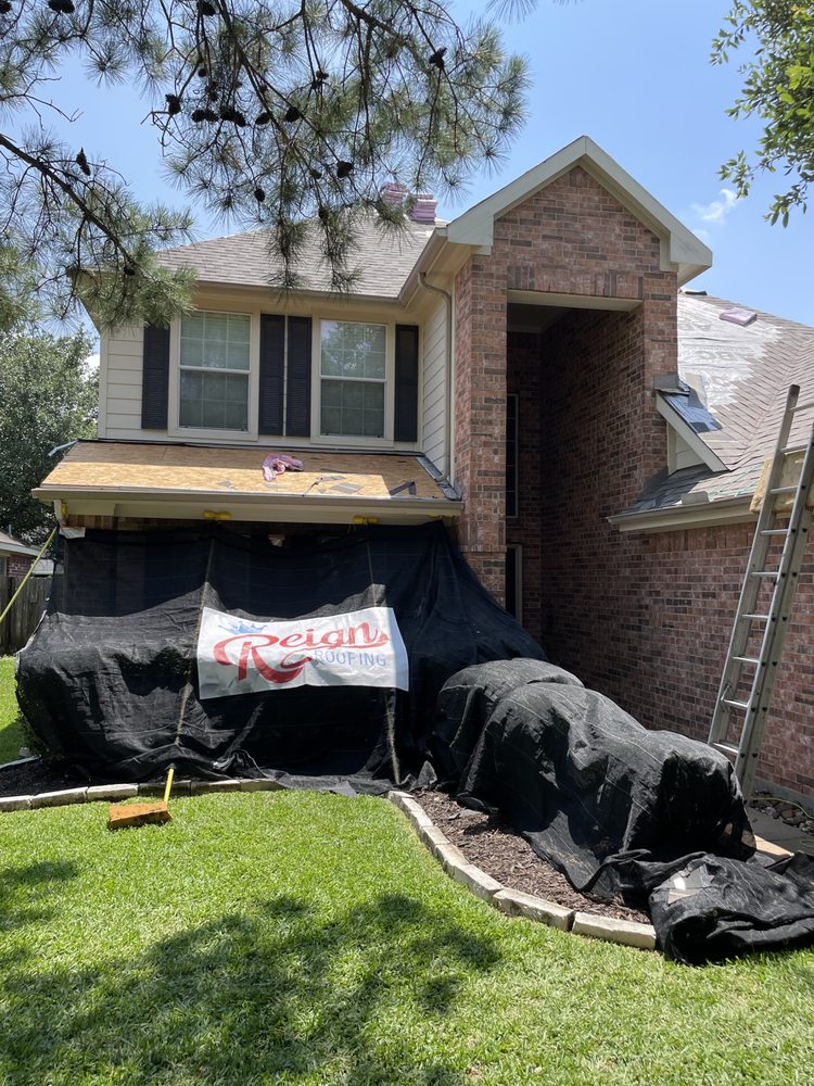 Slide of Reign Roofing