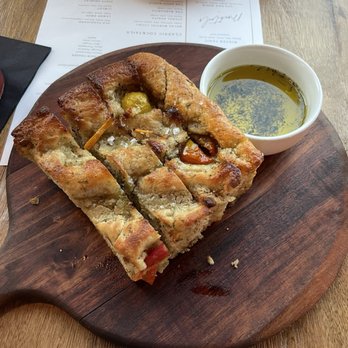 Written By The Seasons - Focaccia bread - New American Near Me - Dallas, Texas Written By The Seasons - Focaccia bread - New American Near Me - Dallas, Texas