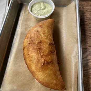 Sofrito Latin Cafe - Venezuelan Empanada (beef). Delicious - Latin American Near Me - Orlando, Florida Sofrito Latin Cafe - Venezuelan Empanada (beef). Delicious - Latin American Near Me - Orlando, Florida