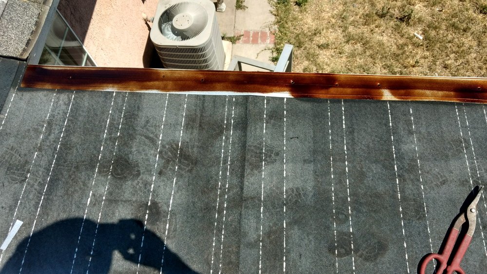 Slide of Magic Hands Roofing