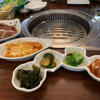 Korea House - The veggies that come with the meal, the spicy rice dish (left), pork bulgogi waiting to be grilled, shrimp tempura basket. - Korean Near Me - Houston, Texas Korea House - The veggies that come with the meal, the spicy rice dish (left), pork bulgogi waiting to be grilled, shrimp tempura basket. - Korean Near Me - Houston, Texas
