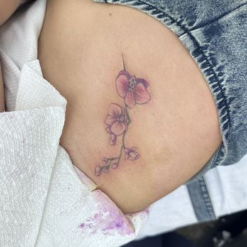 Clandestine Rabbit Tattoo - My daughters ribs - Tattoo Near Me - Tarzana, California Clandestine Rabbit Tattoo - My daughters ribs - Tattoo Near Me - Tarzana, California