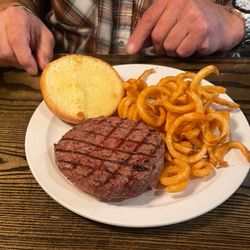Good Times Restaurant & Bar - "Damn Good" hamburger and curly fries.