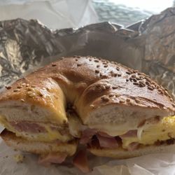 Bagelicious LLC in King Of Prussia - Ham, egg and cheese on sesame bagel.