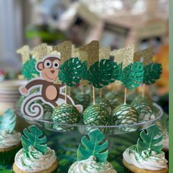You Name It Cookies - Jungle cookie pops for "wild one" Birthday... also they gave me these cute leaf cupcakes for free!