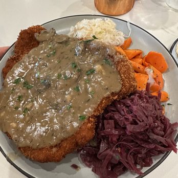 Prost Beer Hall - Pork cutlet schnitzel, mentioned in review. You can't see my potatoes as they're under the schnitzel. - Cocktail Bars Near Me - Elk Grove, California Prost Beer Hall - Pork cutlet schnitzel, mentioned in review. You can't see my potatoes as they're under the schnitzel. - Cocktail Bars Near Me - Elk Grove, California