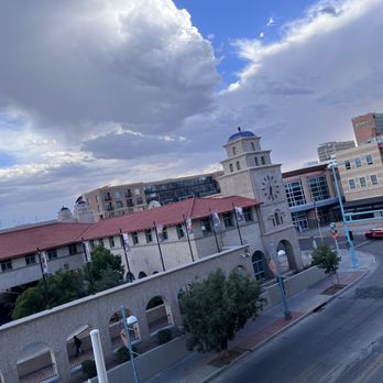 Canvas Artistry - a view of a city with a clock tower - Tacos Near Me - Albuquerque, New Mexico