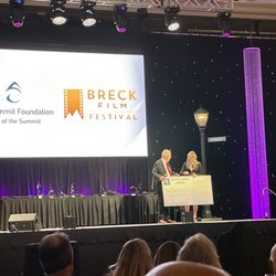Leah Canfield- Coldwell Banker Mountain Properties - Leah securing a large donation for Breck Film Festival