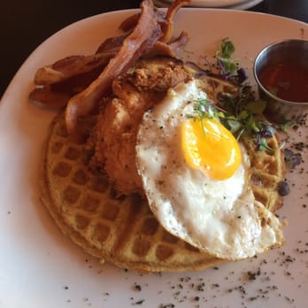 Crave - Chicken and waffles with egg and bacon! Pretty Tasty for an Ohio location!!! Impressive chef! - New American Near Me - Akron, Ohio